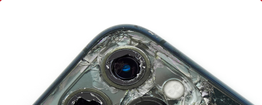 Shattered rear camera glass on a phone